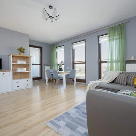 Grey In With View And Balcony By Renters Daire Varşova