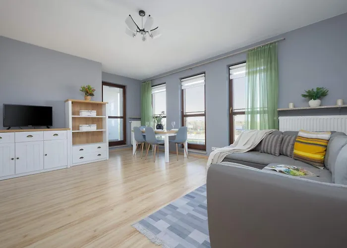 Grey In With View And Balcony By Renters Apartament Warszawa